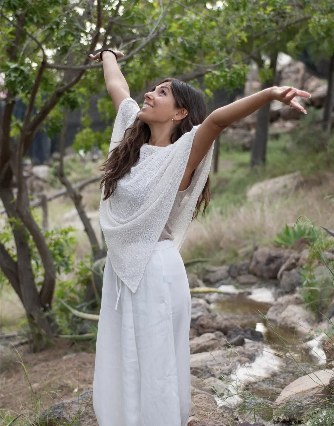 Malù moving outdoors during a somatic practice